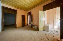 Unique Investment Opportunity in the Heart of Portimão with Rehabilitation Potential