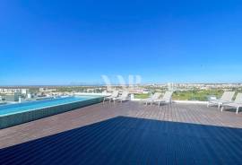 Modern 2-Bedroom Apartment with Sea View and Rooftop Pool in Faro