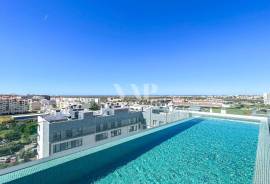 Modern 2-Bedroom Apartment with Sea View and Rooftop Pool in Faro