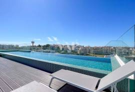 Modern 2-Bedroom Apartment with Sea View and Rooftop Pool in Faro