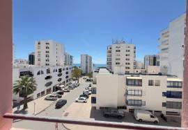 Quarteira Investment Apartment – Refurbished 2-Bedroom with Sea Views, Garage and Roof Terrace