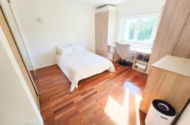 Modern, spacious T5 condominium with two pools & more