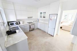 Modern, spacious T5 condominium with two pools & more
