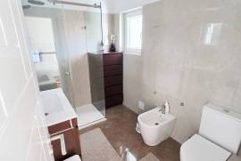 Modern, spacious T5 condominium with two pools & more