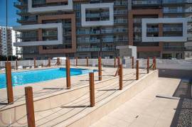 Fantastic T1 with swimming pool, parking, balcony and concierge 150 meters from the beach