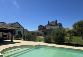 Superb chateau in the Art Deco style with significant outbuildings, guest lodge & pool