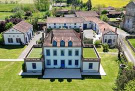 Superb chateau in the Art Deco style with significant outbuildings, guest lodge & pool