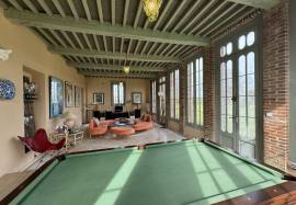 Superb chateau in the Art Deco style with significant outbuildings, guest lodge & pool