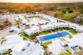 The Enclave: Ultra-Modern 3 Bedroom Villa Located Minutes From the Beach!