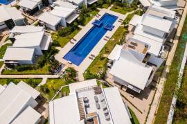 The Enclave: Ultra-Modern 3 Bedroom Villa Located Minutes From the Beach!
