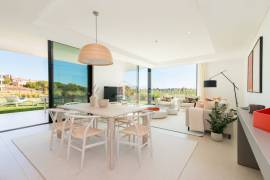Modern apartment in Monte Rei, overlooking the Atlantic and golf course.