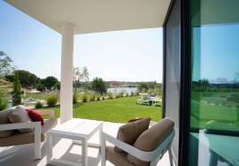 Modern apartment in Monte Rei, overlooking the Atlantic and golf course.