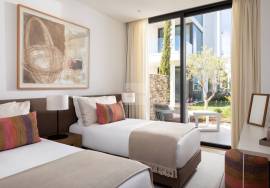Modern apartment in Monte Rei, overlooking the Atlantic and golf course.