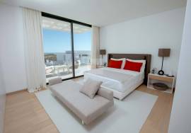 Modern apartment in Monte Rei, overlooking the Atlantic and golf course.