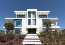 Modern apartment in Monte Rei, overlooking the Atlantic and golf course.