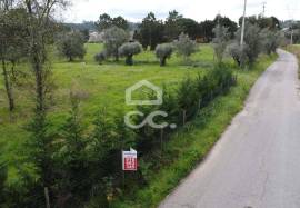 Land with 1753 m2 and approved project for detached house in Parceiros , Leiria.