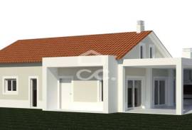 Land with 1753 m2 and approved project for detached house in Parceiros , Leiria.