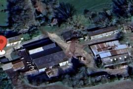 Farm Complex in Rolling Countryside Setting
