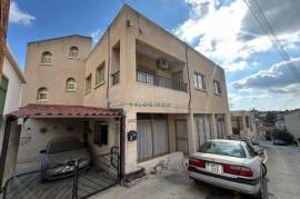 Mixed-use building for sale situated in Lympia, Nicosia.