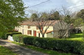 €129000 - Charming 2-Bedroom Village House with Renovation Project and Spacious Grounds