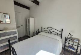 Investment Property With 2 Flats, 2 Courtyards And Commercial Premises, Situated Right In The Centre Of The Village, In A Strategic Location.