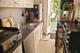 Investment Property With 2 Flats, 2 Courtyards And Commercial Premises, Situated Right In The Centre Of The Village, In A Strategic Location.