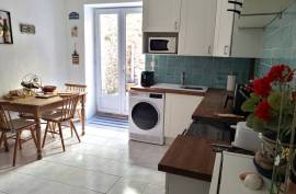 Investment Property With 2 Flats, 2 Courtyards And Commercial Premises, Situated Right In The Centre Of The Village, In A Strategic Location.