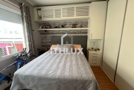 Charming furnished apartment, 42m², for sale, 1 bedroom, large living room, social bathroom, 1 covered parking space garage, Santana, POA/RS