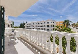 1 bedroom apartment with wrap around terrace near golf & beach