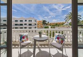 1 bedroom apartment with wrap around terrace near golf & beach