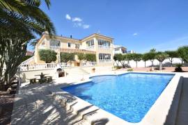 STUNNING 4 BEDROOM HOME WITH VIEWS, POOL, SUMMER KITCHEN AND GARAGE