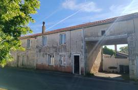 Two Houses with a Garden and Outbuildings - €93,500