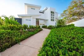 The Enclave: Ultra-Modern 5 Bedroom Villa Located Minutes From the Beach!
