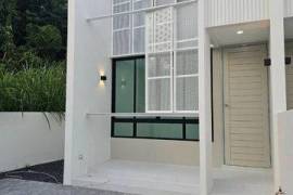 A finished house in a modern Ratsada-Kooku project for 2.99 million baht