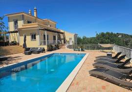 Beautiful 3 + 1 -bedroom villa with breathtaking views over the countryside and sea view in São Brás de Alportel