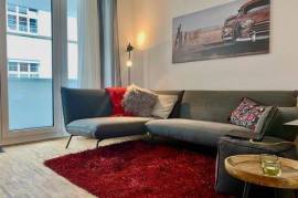 New and centrally located apartment with underground parking space