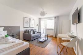 Modern apartment with balcony and view of Cramer-Klett Park