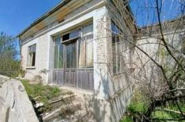 An old house with a huge garden of 2500 sq.m. area