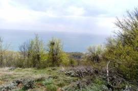 Plot of land with sea view on the plateau next to the golf courses