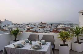 A Rare PENTHOUSE Hideaway in the Heart of Old Town Lagos A Rare PENTHOUSE Hideaway in the Heart of Old Town Lagos