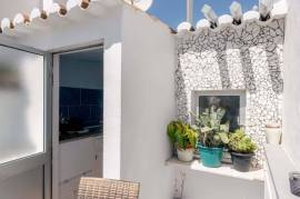 Three Bedroom Townhouse in the Heart of Burgau with Endless Potential