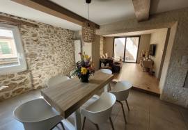 A Superb, Renovated Village House Offering 115 M2 Of Living Space, With Cellars And Terraces.