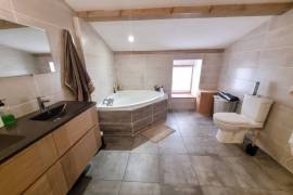 A Superb, Renovated Village House Offering 115 M2 Of Living Space, With Cellars And Terraces.