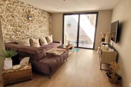 A Superb, Renovated Village House Offering 115 M2 Of Living Space, With Cellars And Terraces.