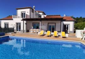 Large villa with a heated pool and mature Mediterranian garden, situated on a popular urbanization of Cerro Azul
