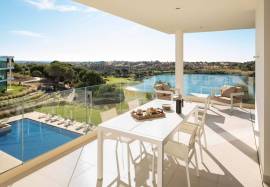 Modern apartment in Monte Rei, overlooking the Atlantic and golf course.