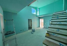 Charming villa in the final stages of construction, located in the quiet village of Tôr, just 10 minutes from Loulé.