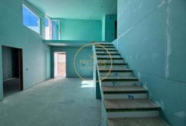 Charming villa in the final stages of construction, located in the quiet village of Tôr, just 10 minutes from Loulé.