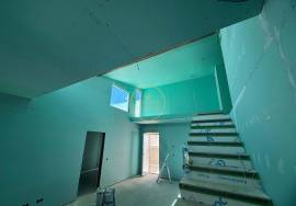 Charming villa in the final stages of construction, located in the quiet village of Tôr, just 10 minutes from Loulé.