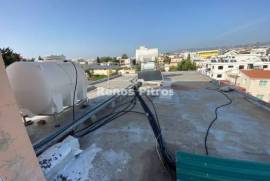 Mixed use three storey Building for sale at Paphos city Center.
